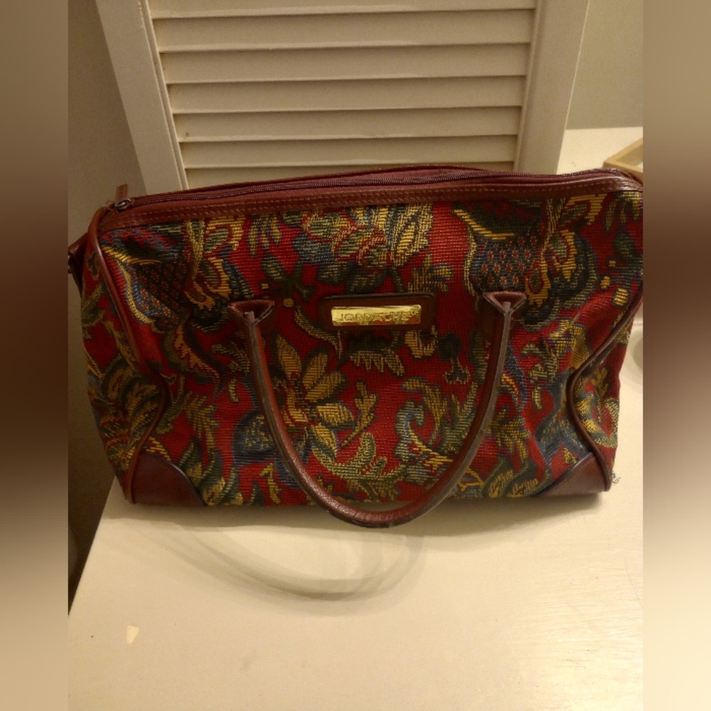 Jordache Vintage women's travel bag with floral tapestry print